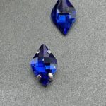 نگین حلزونی به ابعاد 14*10 آبی کاربنی  کد: 1305