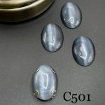 نگین بیضی چشم گربه ای به ابعاد 18*25دودی       c501