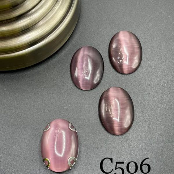 نگین بیضی چشم گربه ای به ابعاد 18*25 عنابی c506