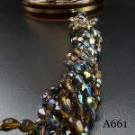 کریستال دو طرف سوراخ سایز ۵*۷ دو رنگ قهوه ای سبز متالیک کد: A661