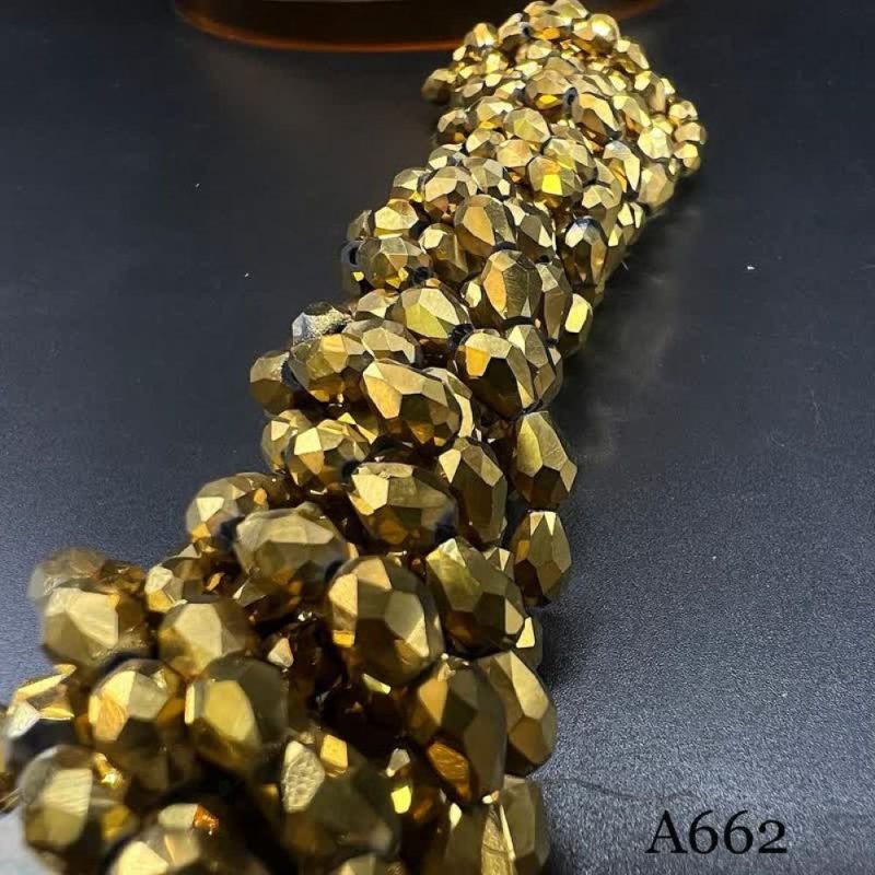 کریستال دو طرف سوراخ سایز ۵*۷ طلایی متالیک کد: A662 - تصویر 1