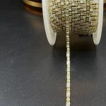 نگین متریzirconباگت+نگین سایز۲*۲+۴*۲نقره ای پایه طلایی افقی mn0438