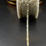 نگین متریzirconباگت+نگین سایز۳*۳+۶*۳نقره ای پایه طلاییmn0442